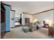 Spacious Primary bedroom with sitting area and ensuite bathroom access at 8876 S Santa Elizabeth Dr, Goodyear, AZ 85338