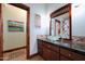 Bathroom boasts a vessel sink and stylish vanity at 8876 S Santa Elizabeth Dr, Goodyear, AZ 85338