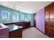 Laundry room with ample counter space and cabinets at 8876 S Santa Elizabeth Dr, Goodyear, AZ 85338