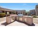 High-end stainless steel outdoor kitchen with built-in appliances at 8876 S Santa Elizabeth Dr, Goodyear, AZ 85338