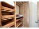 Large closet with built-in shelves and drawers at 8876 S Santa Elizabeth Dr, Goodyear, AZ 85338