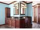 Elegant bathroom with double sinks and corner vanity at 8876 S Santa Elizabeth Dr, Goodyear, AZ 85338