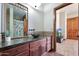 Elegant bathroom with granite countertop and vessel sink at 8876 S Santa Elizabeth Dr, Goodyear, AZ 85338