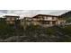 Stunning contemporary home nestled into the mountainside at 41521 N 75Th Pl, Cave Creek, AZ 85331