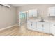 Small kitchen with white cabinets and a modern sink at 27502 N Freedom St, San Tan Valley, AZ 85144