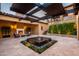 Private courtyard with fireplace and water feature at 24546 N 91St St, Scottsdale, AZ 85255