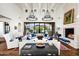 Bright living room with hardwood floors, fireplace and mountain views at 24546 N 91St St, Scottsdale, AZ 85255