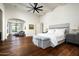 Main bedroom with sitting area and hardwood floors at 24546 N 91St St, Scottsdale, AZ 85255