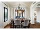 Elegant dining room with hardwood floors and chandelier at 24546 N 91St St, Scottsdale, AZ 85255