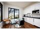 Small, well-equipped kitchen with white cabinets and modern appliances at 24546 N 91St St, Scottsdale, AZ 85255