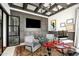 Modern home office with built-in cabinetry and a coffered ceiling at 24546 N 91St St, Scottsdale, AZ 85255