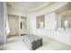Spacious bathroom with double vanities, a large soaking tub, and marble floors at 24546 N 91St St, Scottsdale, AZ 85255