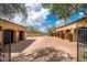 Motor court with double garages and beautiful landscaping at 24546 N 91St St, Scottsdale, AZ 85255