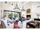 Spacious living area with hardwood floors, fireplace and large windows at 24546 N 91St St, Scottsdale, AZ 85255