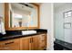 Modern bathroom with a walk-in shower, floating vanity, and stylish tile at 24546 N 91St St, Scottsdale, AZ 85255