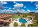 Luxury backyard oasis with a large pool, patio, and mountain views at 24546 N 91St St, Scottsdale, AZ 85255