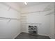 Walk-in closet with wire shelving providing ample storage at 15574 W Vista Grande Ln, Surprise, AZ 85374