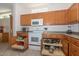 Modern kitchen with ample storage and pull-out drawers at 15574 W Vista Grande Ln, Surprise, AZ 85374