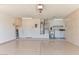 Attached garage with washer, dryer, and ample storage at 15574 W Vista Grande Ln, Surprise, AZ 85374