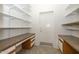 Large pantry with ample shelving and counter space at 15574 W Vista Grande Ln, Surprise, AZ 85374