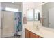 Bathroom with shower/tub combo, single vanity, and tile flooring at 15574 W Vista Grande Ln, Surprise, AZ 85374