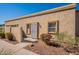 Tan stucco building with a security door and walkway at 1331 E Pierson St, Phoenix, AZ 85014
