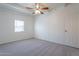 Well-lit bedroom with ceiling fan and ample space at 1331 E Pierson St, Phoenix, AZ 85014