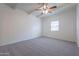 Bright bedroom with ceiling fan and carpeted floor at 1331 E Pierson St, Phoenix, AZ 85014