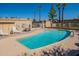Community swimming pool with lounge chairs and picnic area at 1331 E Pierson St, Phoenix, AZ 85014