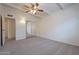 Spacious bedroom featuring mirrored closet doors and ceiling fan at 1331 E Pierson St, Phoenix, AZ 85014