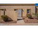 Tan stucco building with a security door and walkway at 1331 E Pierson St, Phoenix, AZ 85014