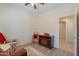 Spacious sitting area with built-in shelving and hardwood floors at 7527 E Elderberry Way, Gold Canyon, AZ 85118