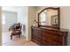 Elegant bedroom with a dresser and a large mirror at 7527 E Elderberry Way, Gold Canyon, AZ 85118