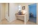 Inviting entryway with a wine rack and small work table at 7527 E Elderberry Way, Gold Canyon, AZ 85118