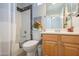 Small bathroom with tub, toilet and vanity at 7527 E Elderberry Way, Gold Canyon, AZ 85118