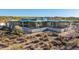 Aerial view of a modern home under construction, showcasing its unique design and setting at 40575 N 109Th Pl, Scottsdale, AZ 85262