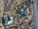 Aerial view of two homes, one under construction, the other complete at 40575 N 109Th Pl, Scottsdale, AZ 85262