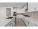 Spacious kitchen featuring white cabinets and expansive countertops at 21354 E Sparrow Dr, Queen Creek, AZ 85142