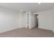 Bedroom with access to bathroom and neutral carpeting at 21354 E Sparrow Dr, Queen Creek, AZ 85142