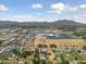Aerial view of neighborhood, showcasing wide open spaces at 18526 E Cloud Rd, Queen Creek, AZ 85142