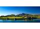 Golf course with water feature and mountain views at 40575 N 109Th Pl, Scottsdale, AZ 85262