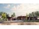Contemporary home with stone accents and desert landscaping at 40575 N 109Th Pl, Scottsdale, AZ 85262