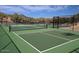 Well-maintained pickleball and tennis courts with mountain views at 40575 N 109Th Pl, Scottsdale, AZ 85262