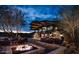 Outdoor patio area with fire pit and comfortable seating at 40575 N 109Th Pl, Scottsdale, AZ 85262