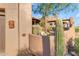 Landscaped courtyard with a tall cactus and stucco walls at 13330 E Jomax Rd, Scottsdale, AZ 85262