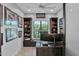 Home office with built-in bookshelves and a large desk at 3749 E Juniper Cir, Mesa, AZ 85205