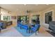 Spacious covered patio with built-in kitchen and seating area at 3749 E Juniper Cir, Mesa, AZ 85205
