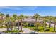 Luxury estate home with a large driveway and lush landscaping at 3749 E Juniper Cir, Mesa, AZ 85205