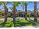 Luxury home exterior with palm trees and circular driveway at 3749 E Juniper Cir, Mesa, AZ 85205