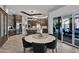 Kitchen with breakfast nook and access to backyard patio at 3749 E Juniper Cir, Mesa, AZ 85205